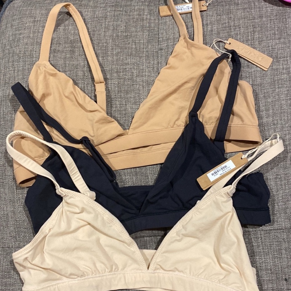 SKIMS Tan, Black bras